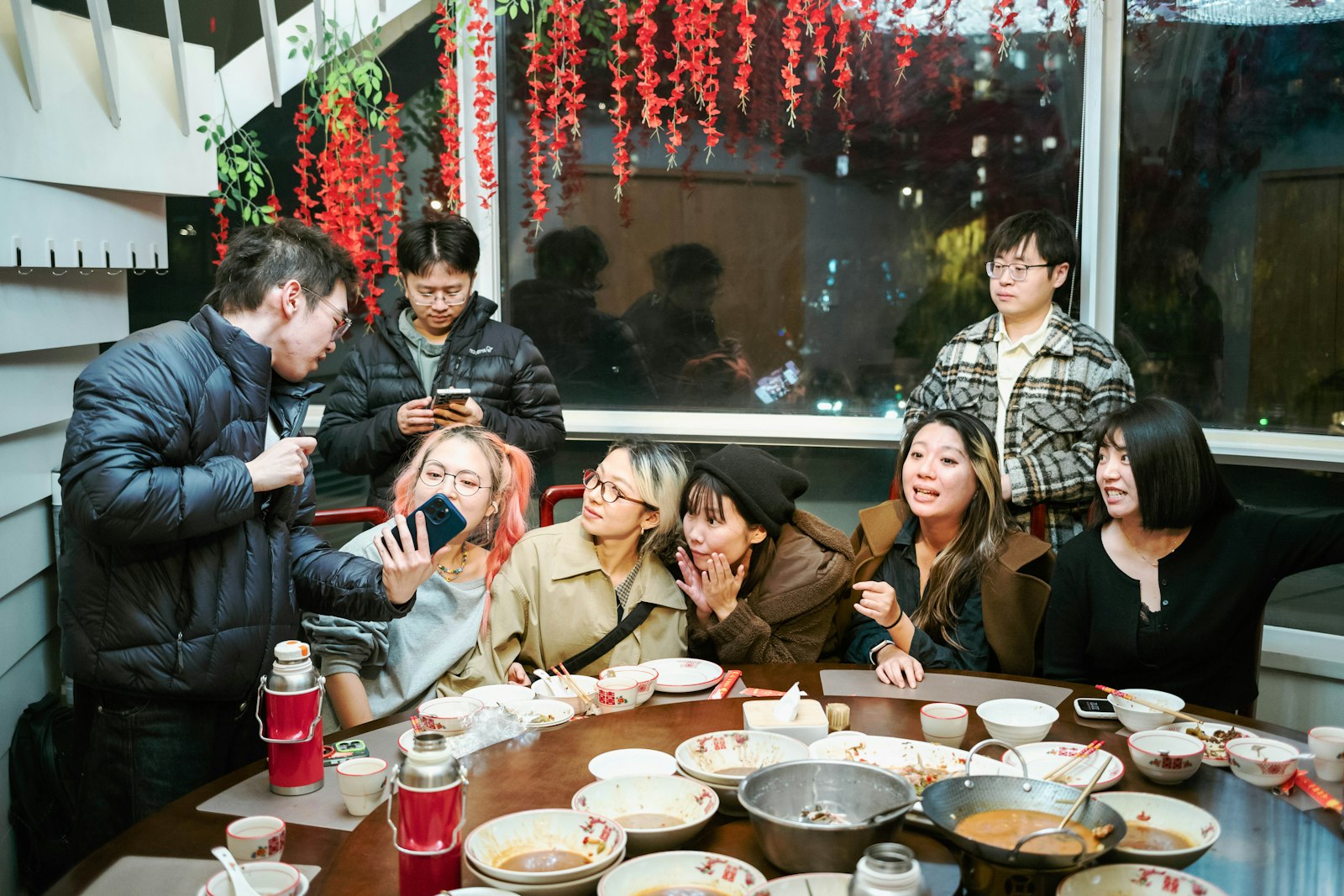 Friends gathered around a shared meal