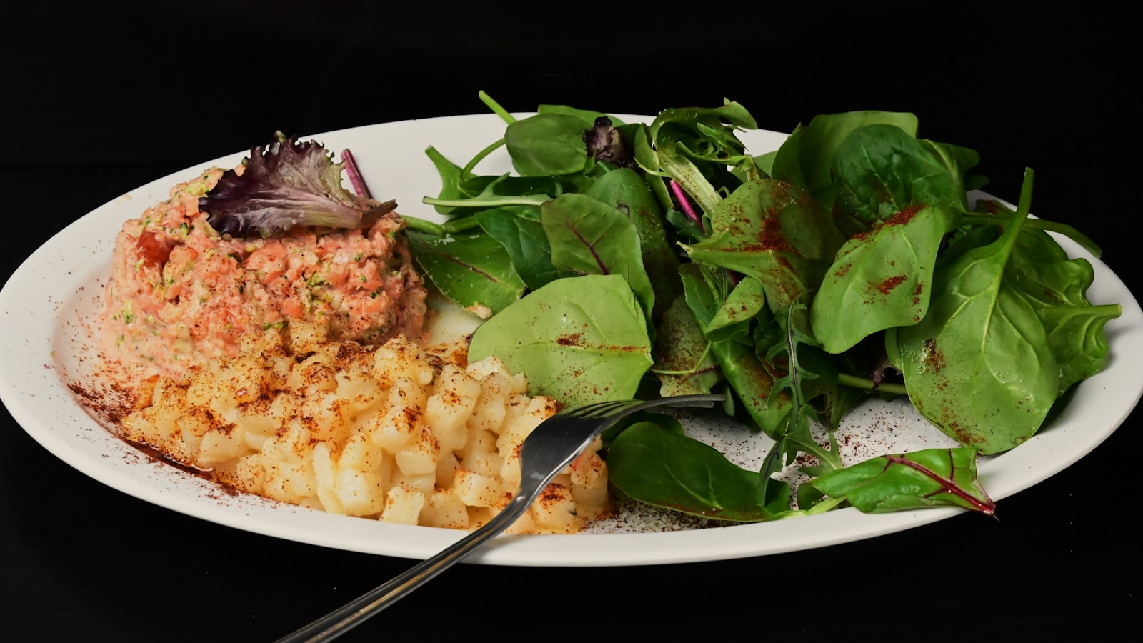 Signature soul food plate with meat and vegetables